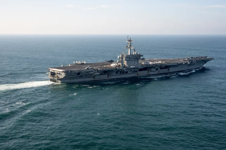 Aircraft carrier relieves long-deployed USS Lincoln
